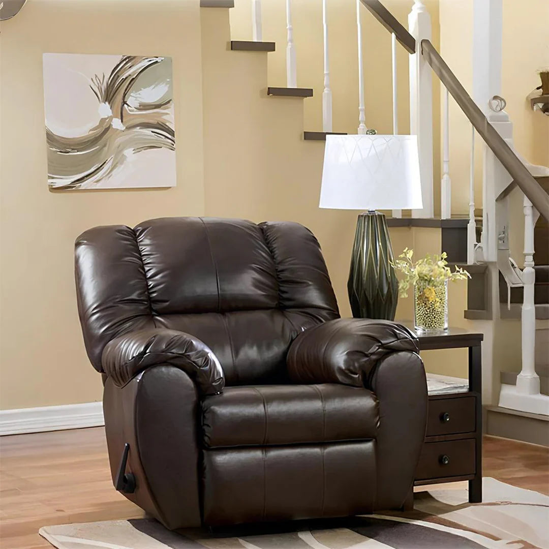 Brown leather recliner chair in modern living room with side table and lamp