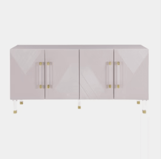 Modern blush sideboard with gold handles and acrylic legs for contemporary home decor