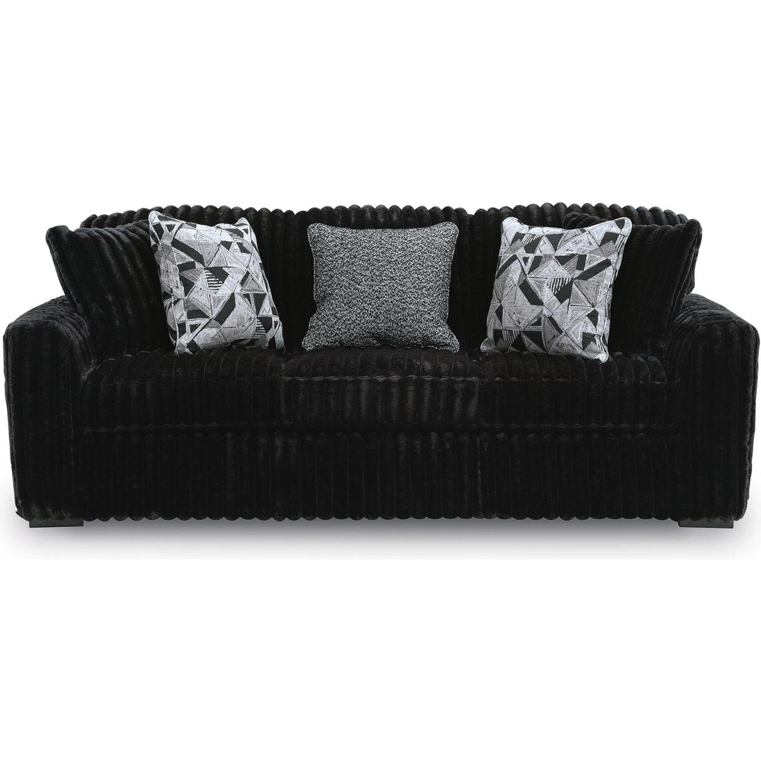 Midnight Madness sofa in Onyx jumbo corduroy, straight-on front view showing the wide-wale ribbing