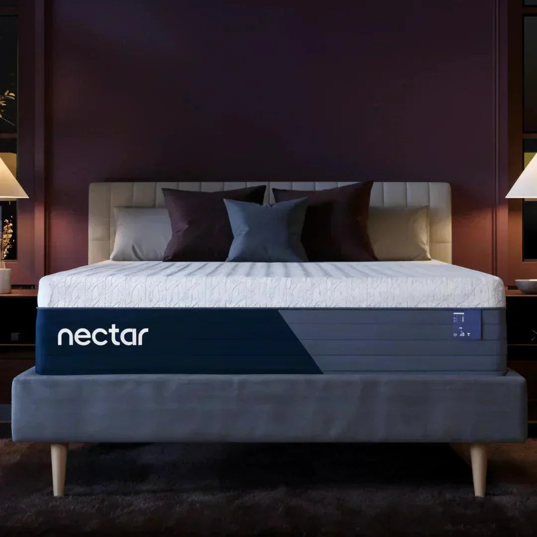 Nectar mattress on modern bed frame with plush pillows in cozy bedroom setting