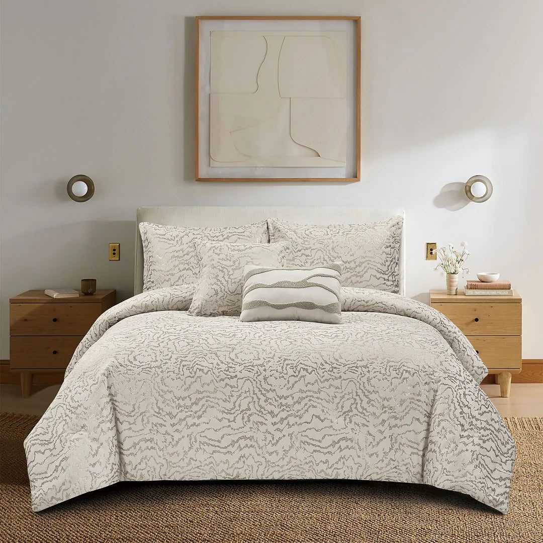 Modern bedroom with patterned duvet set, wooden nightstands, and abstract wall art for cozy home decor