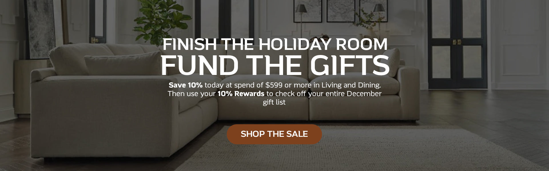 Living room with a couch for a holiday sale.