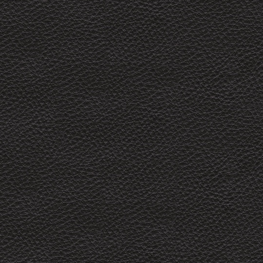 Close-up of the Gavello Midnight faux leather upholstery, showing its fine pebbled grain