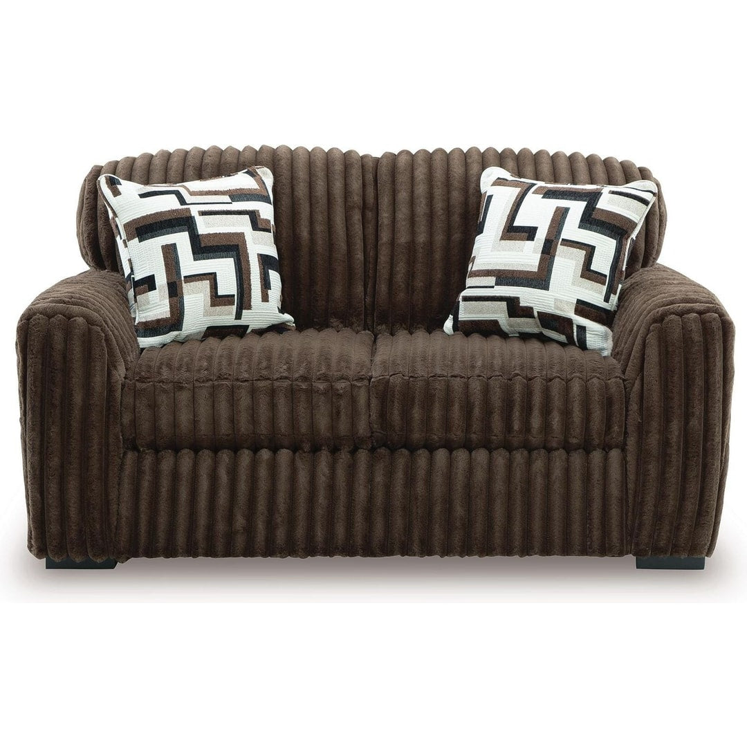 Midnight Madness loveseat in Chocolate jumbo corduroy, straight-on front view showing the wide-wale ribbing