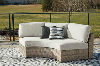 Calworth Outdoor Curved Loveseat with Cushion